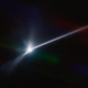 A bright ray of light shows the debris trail caused by NASA's DART test.